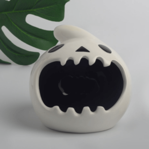 ceramic hamster hideout in scary ghost shape, available in small and large sizes